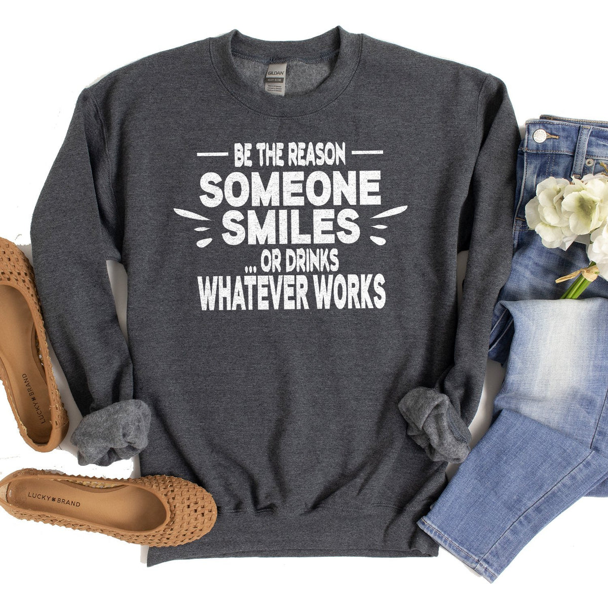 Be The Reason Someone Smiles Or Drinks Whatever Works - Long Sleeve Heavy Crewneck Sweatshirt